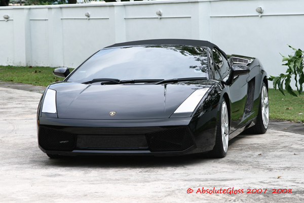 Lamborghini Gallardo Black Background. The lack Gallardo does look
